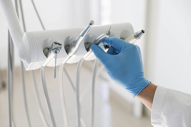Professional Tooth Extraction technician working in Pecan Plantation, TX